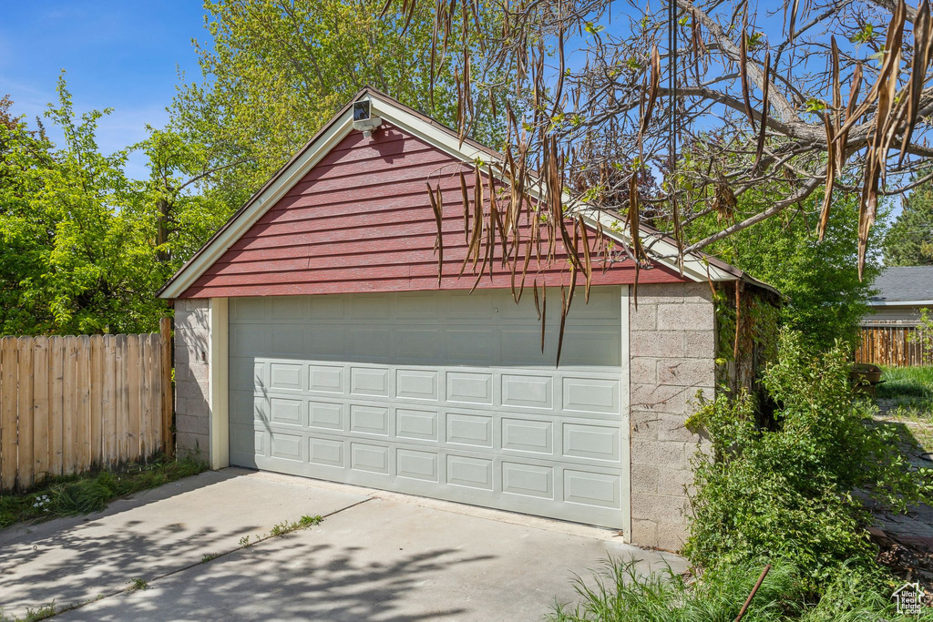 Detached garage with fence