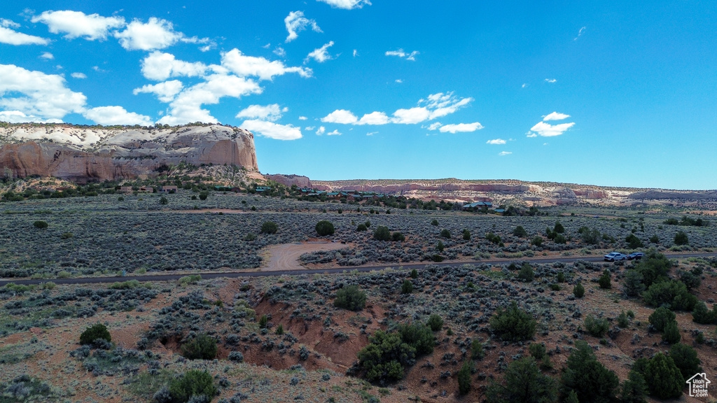 View of mountain backdrop featuring a desert landscape and rural landscape