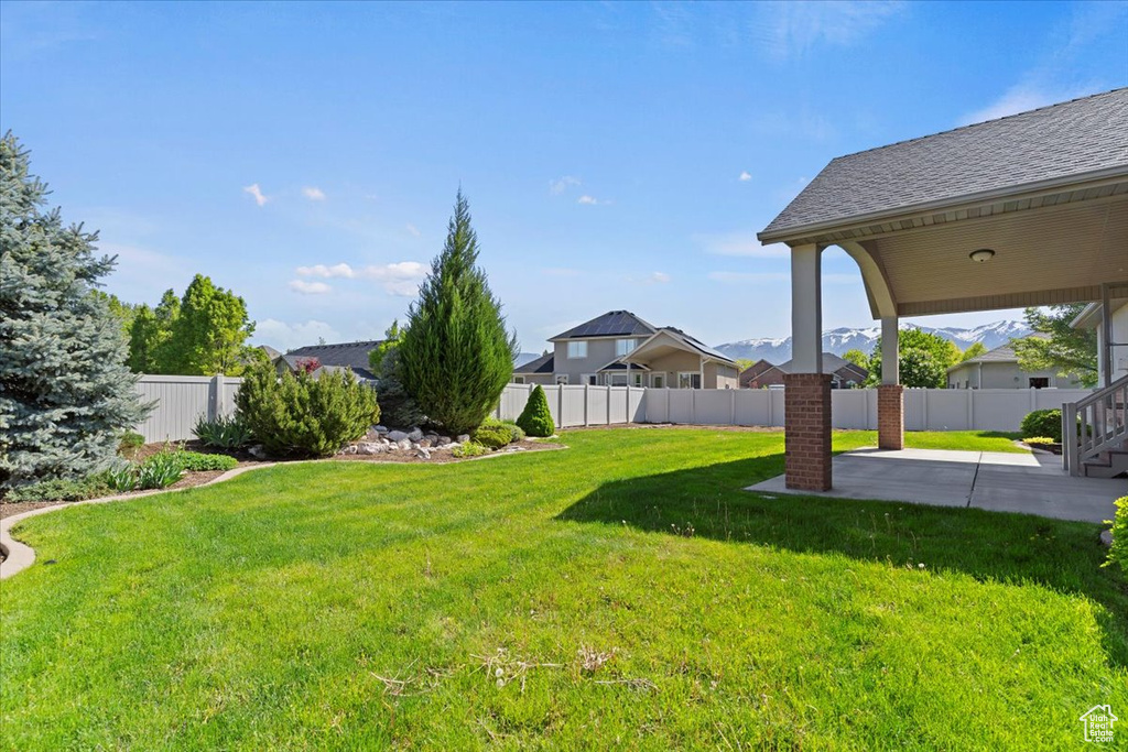 View of yard with a patio
