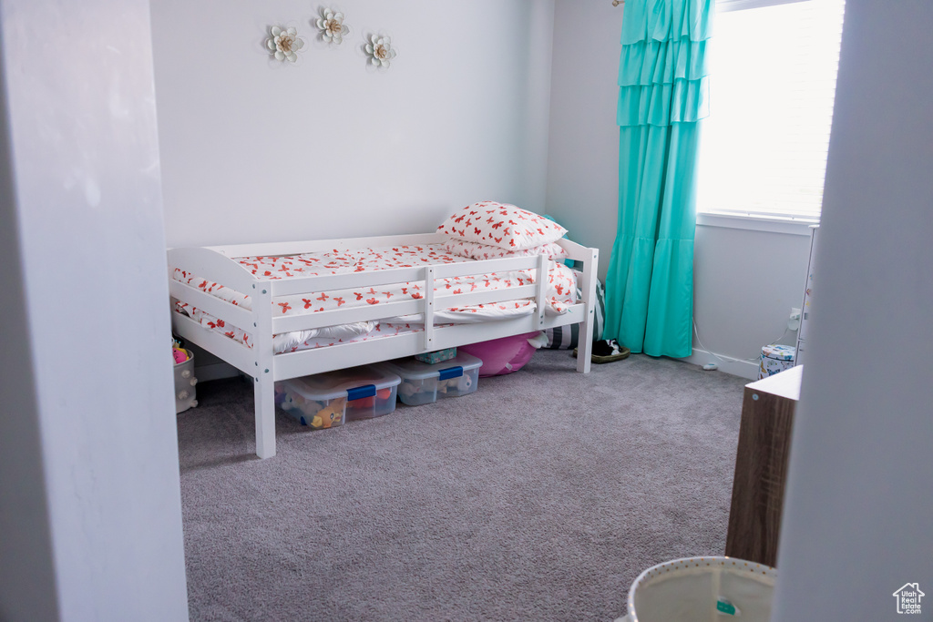 Bedroom featuring carpet floors