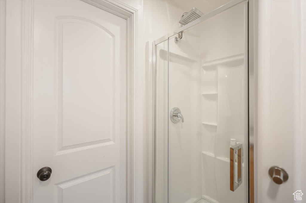Full bath with a shower stall
