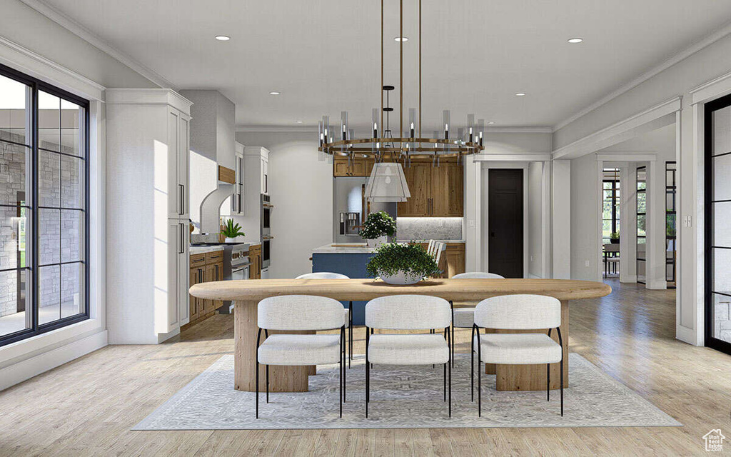 Dining room with recessed lighting, ornamental molding, and light wood finished floors