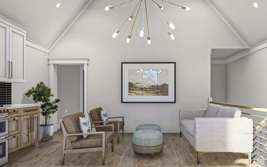 Living area with high vaulted ceiling, a chandelier, and wood finished floors