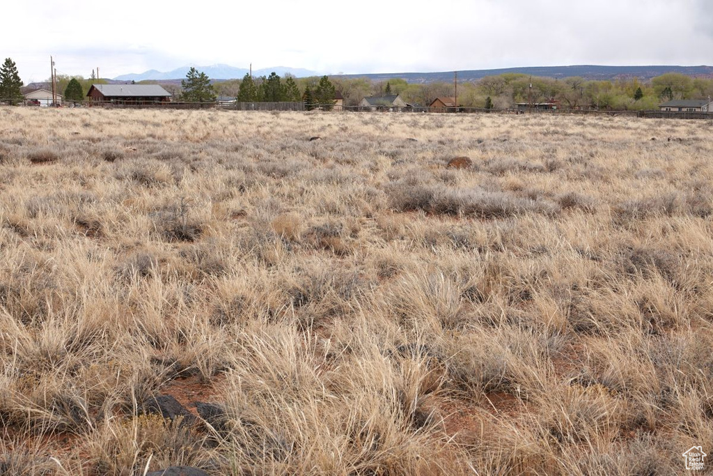 View of local wilderness featuring rural landscape and a mountain backdrop