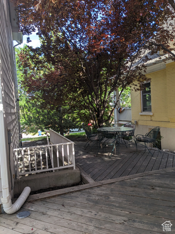 Wooden deck with outdoor dining space