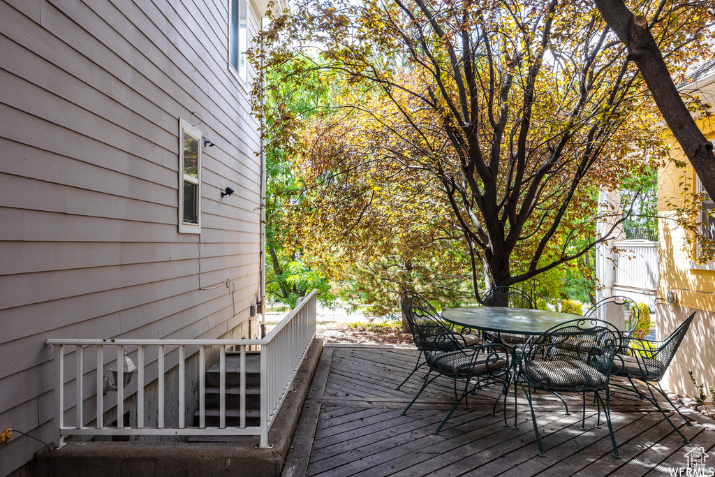 Wooden terrace with outdoor dining area