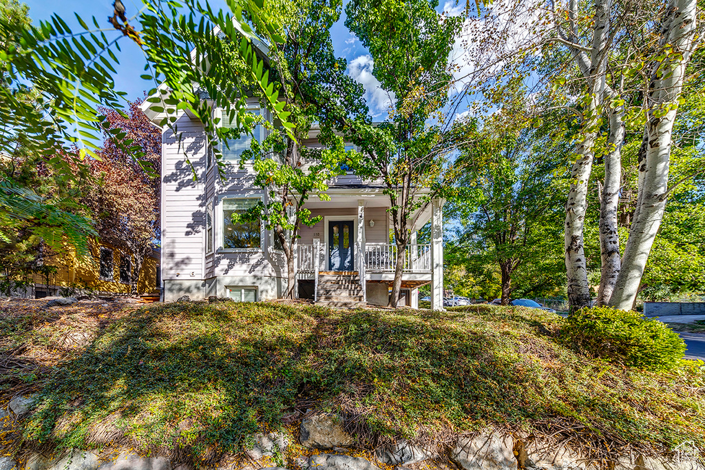 View of front of house featuring covered porch