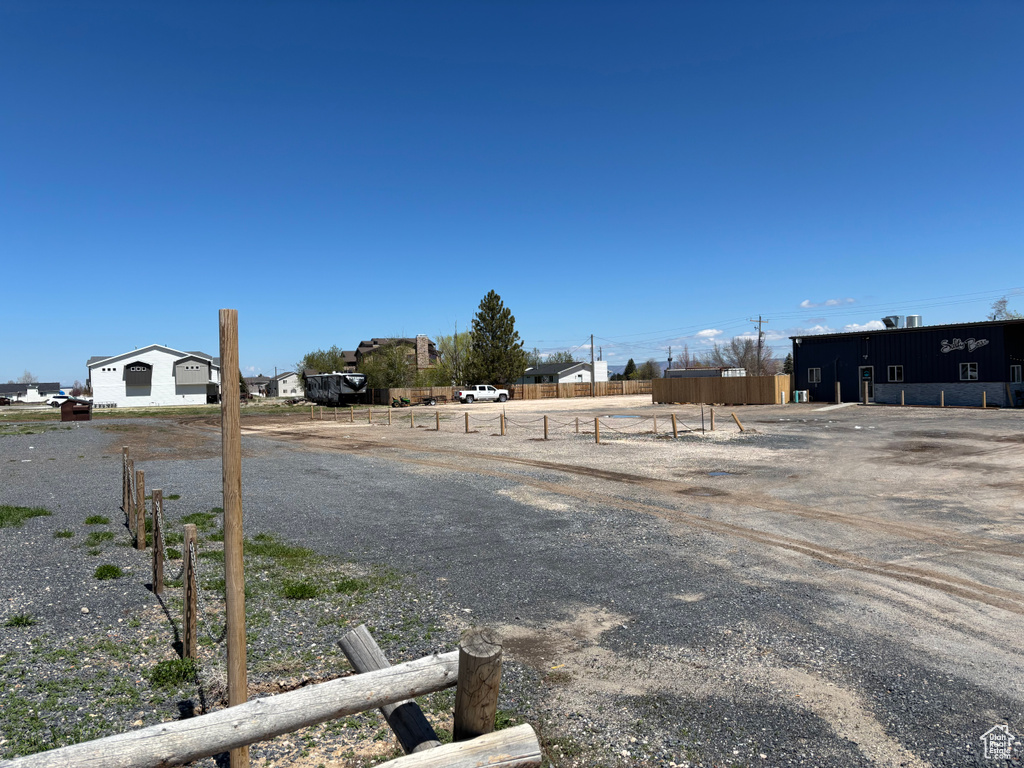View of yard featuring fence