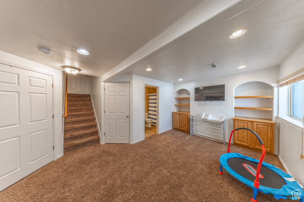 Game room with carpet flooring, baseboards, recessed lighting, and a textured ceiling