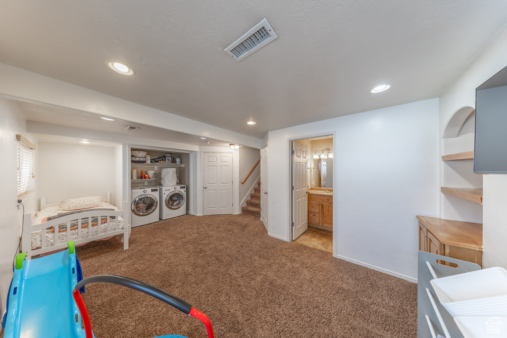Bedroom featuring separate washer and dryer, carpet floors, recessed lighting, and baseboards