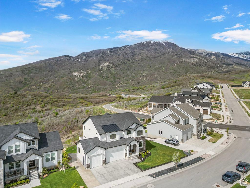 Aerial view of residential area with a mountain backdrop