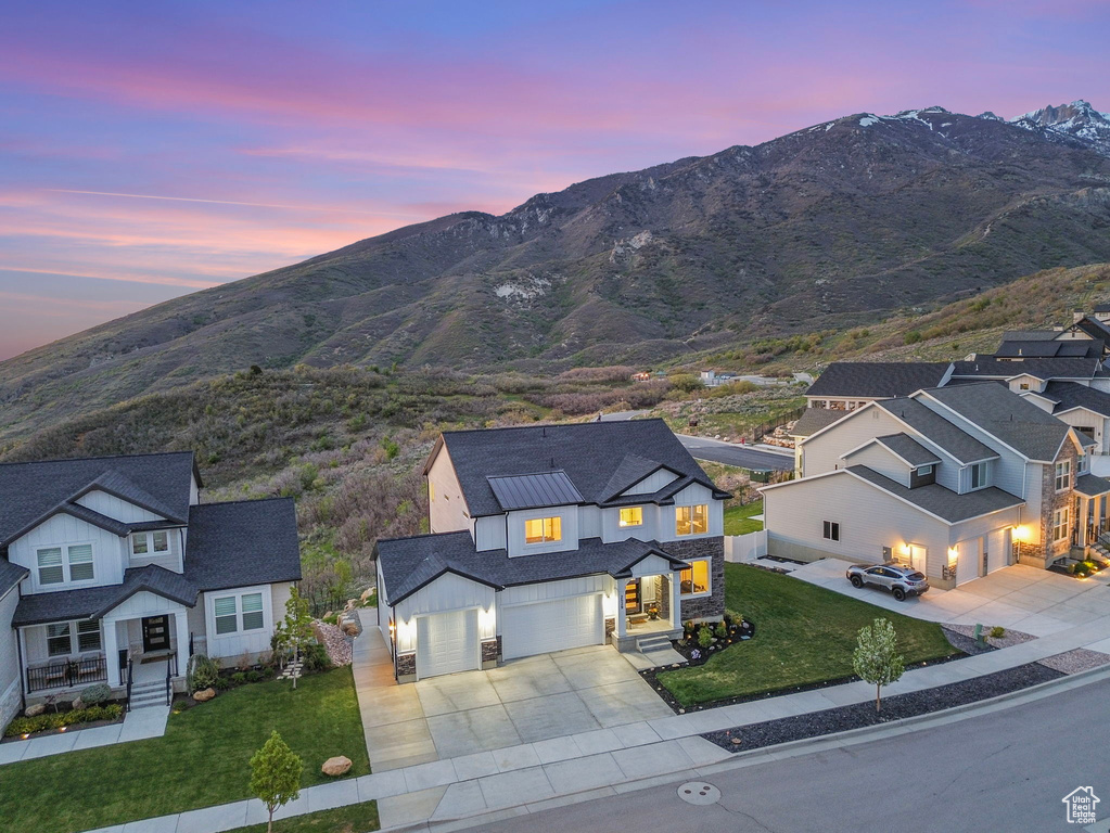 View of mountain background featuring nearby suburban area