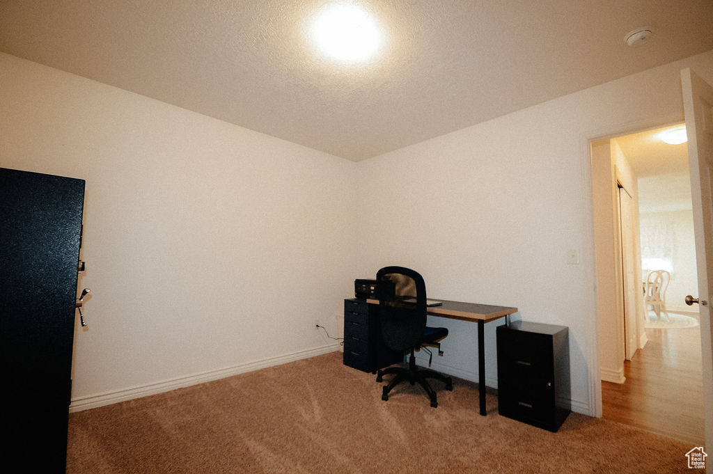 Office featuring carpet floors and baseboards