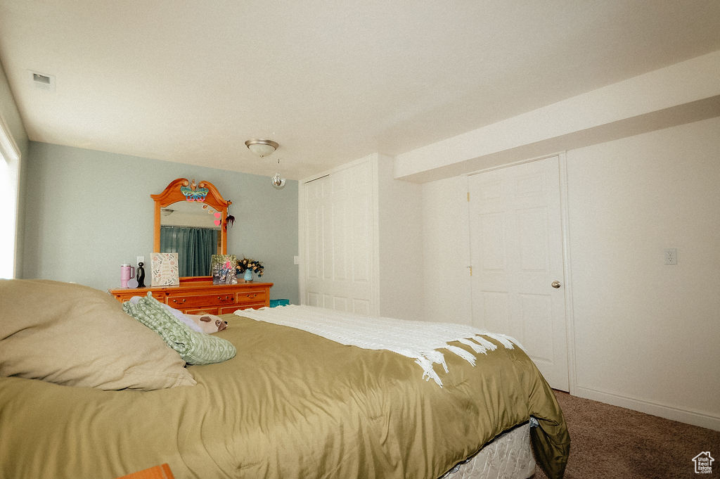 Bedroom with carpet floors