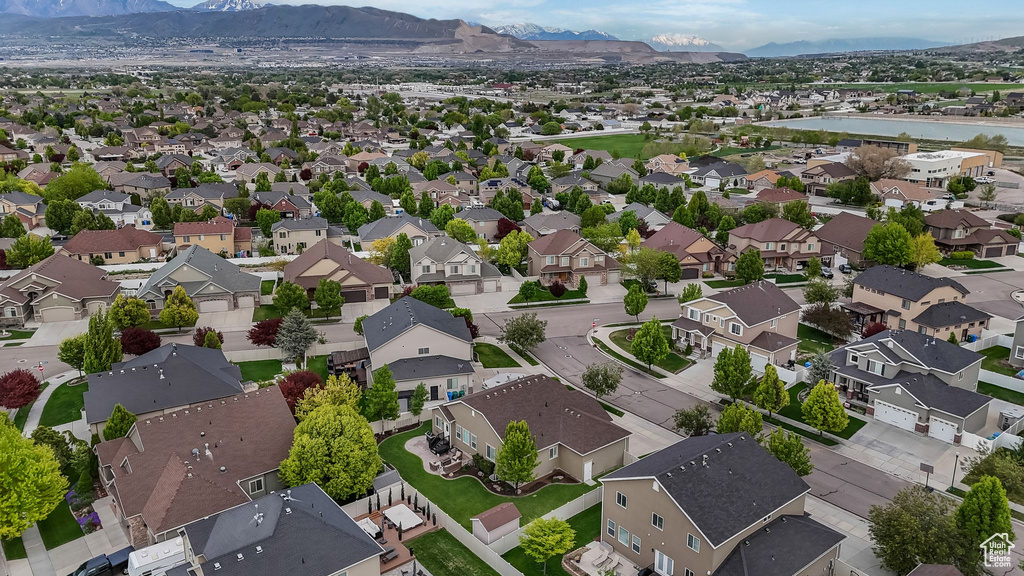 Aerial perspective of suburban area featuring mountains
