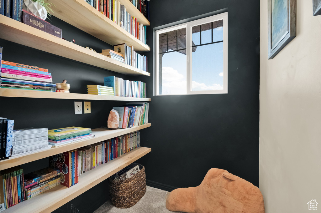Sitting room with wall of books