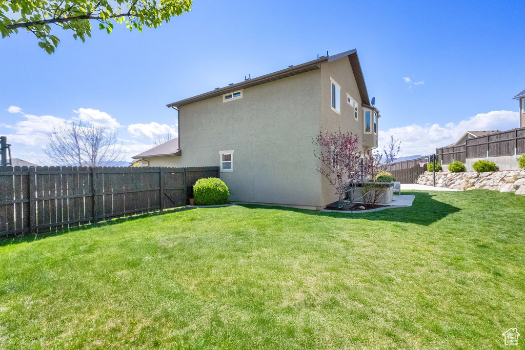 View of property exterior with stucco siding