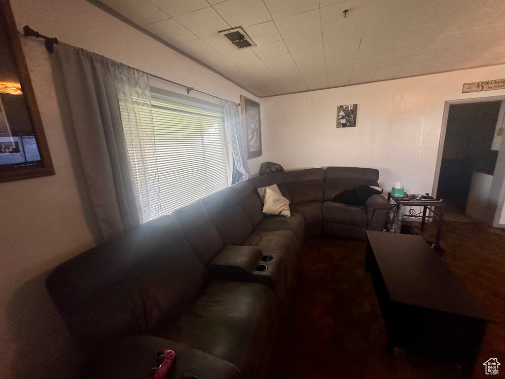 Living room featuring visible vents