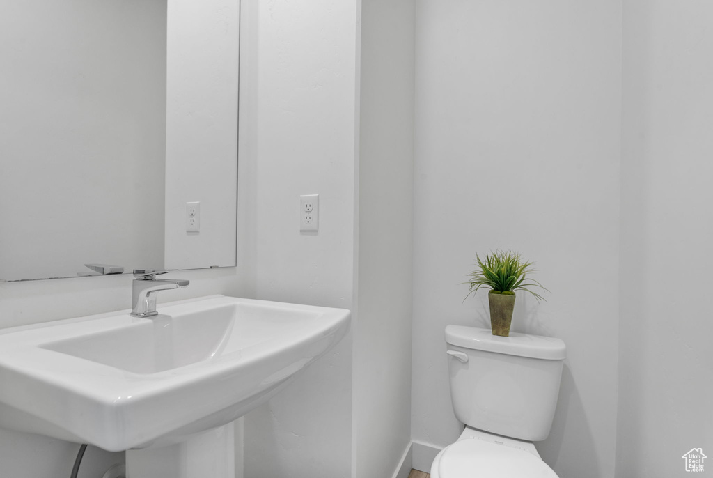 Bathroom with a sink and toilet