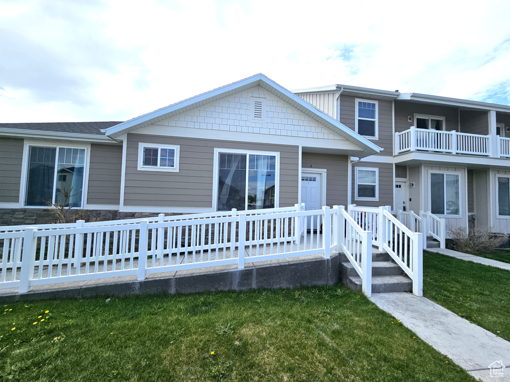 View of front of house with a front lawn