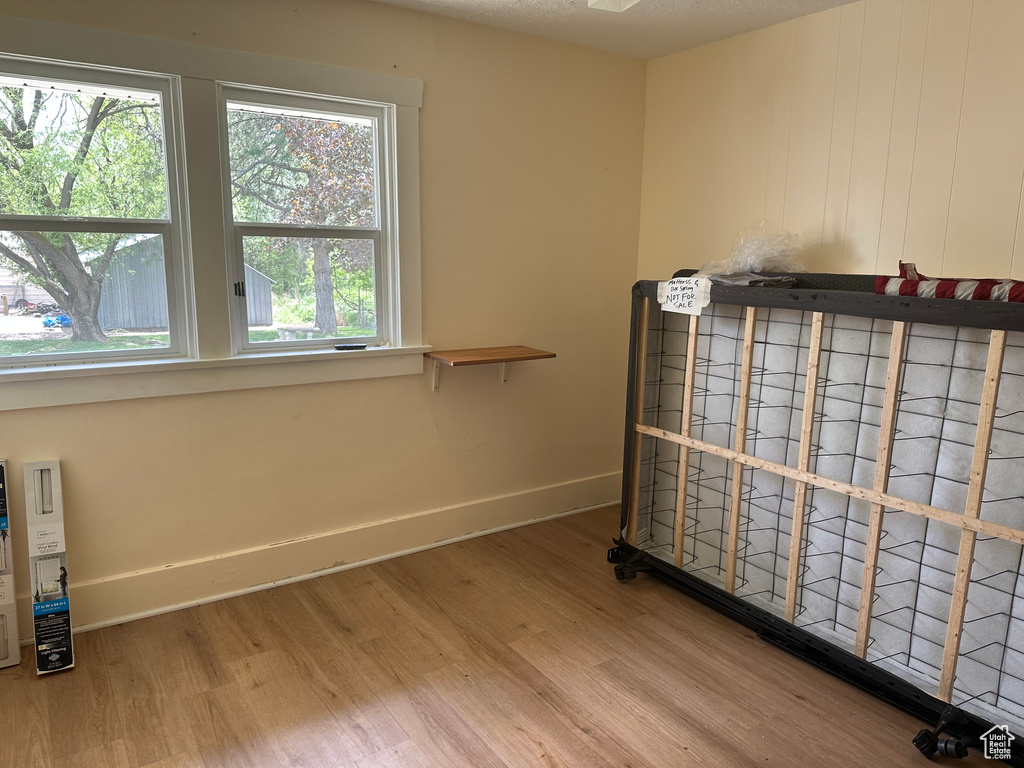Detailed view of wood finished floors and baseboards