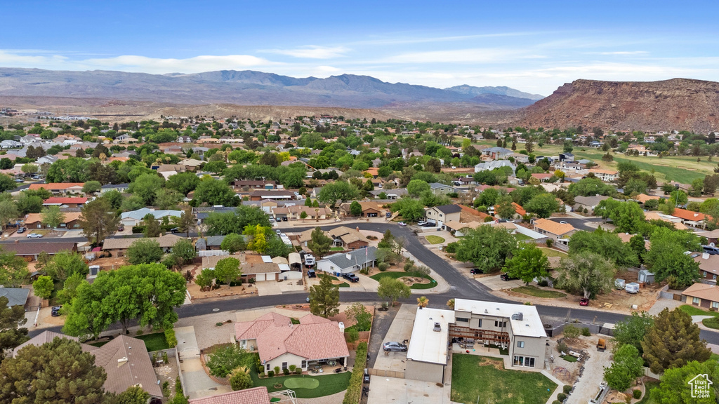 Birds eye view of property featuring a mountain view and a residential view