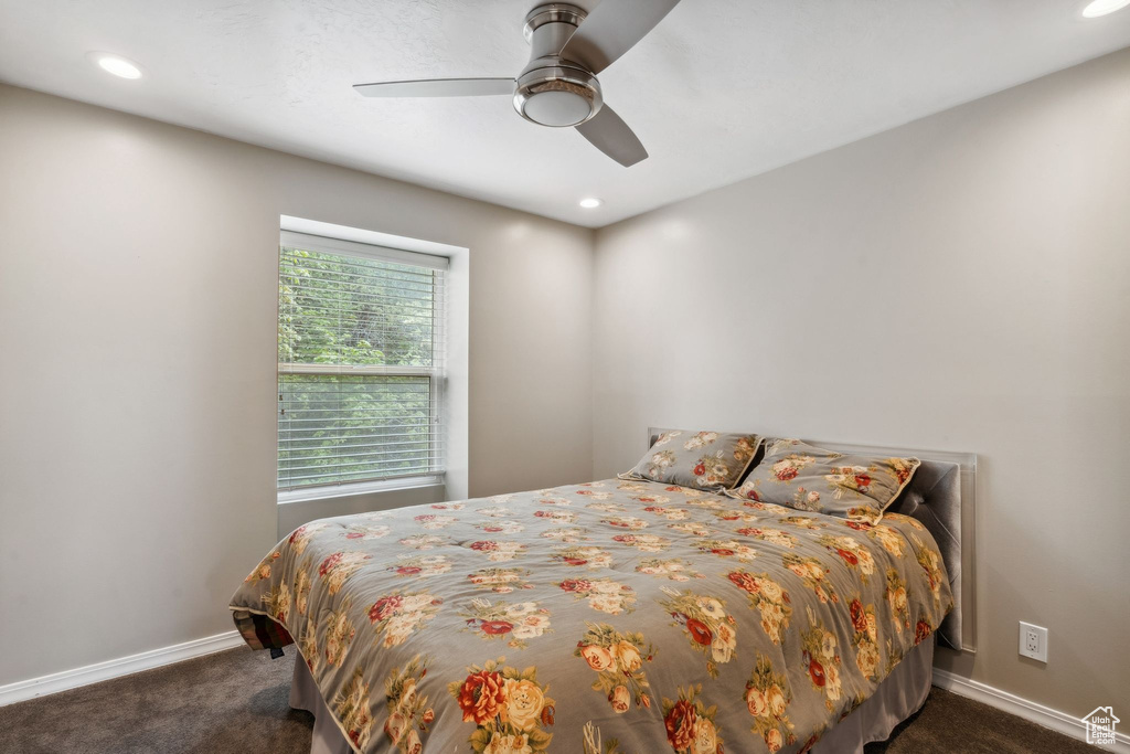 Bedroom featuring carpet floors, baseboards, recessed lighting, and ceiling fan