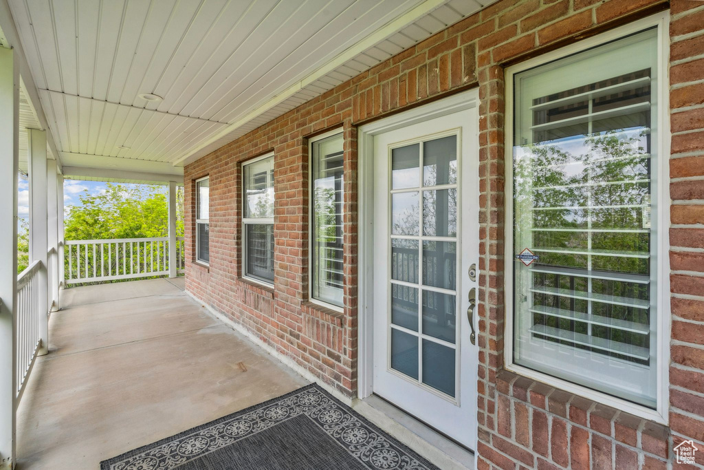 Balcony featuring covered porch