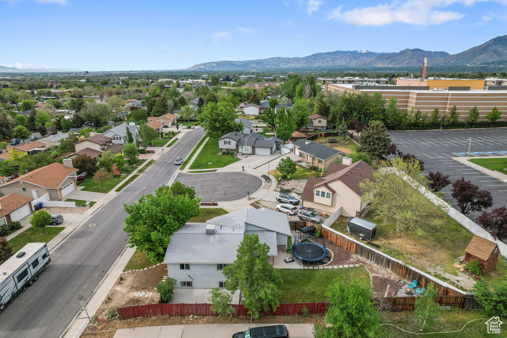 Aerial view of residential area with a mountain backdrop
