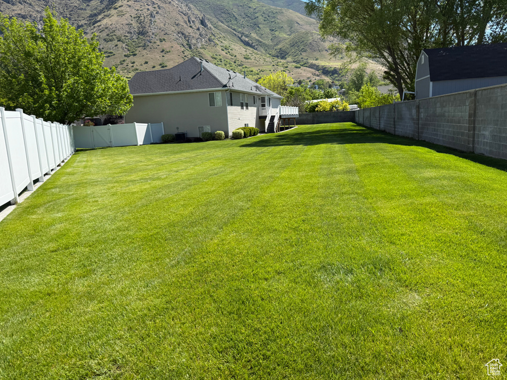 View of yard with a mountain view