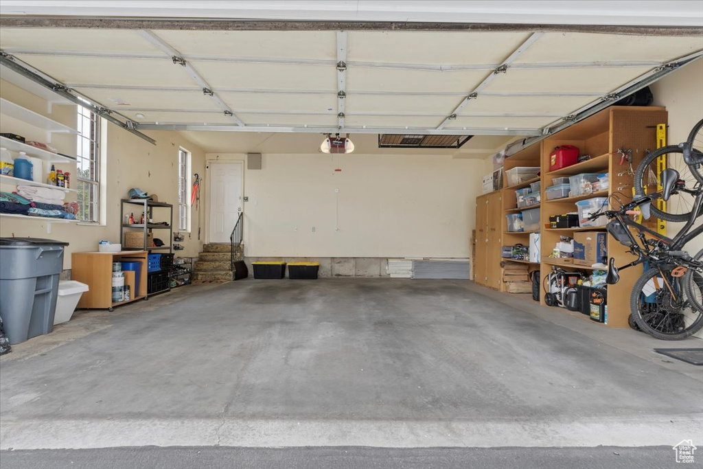 Garage featuring a garage door opener