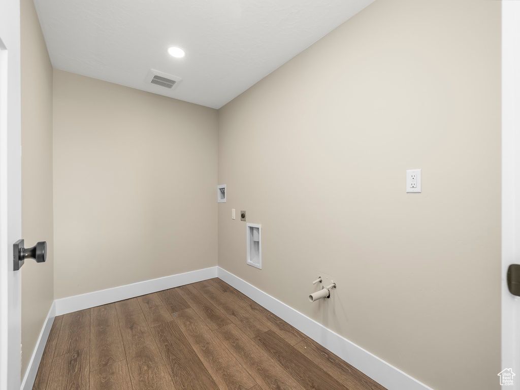 Washroom with washer hookup, laundry area, baseboards, and gas dryer hookup