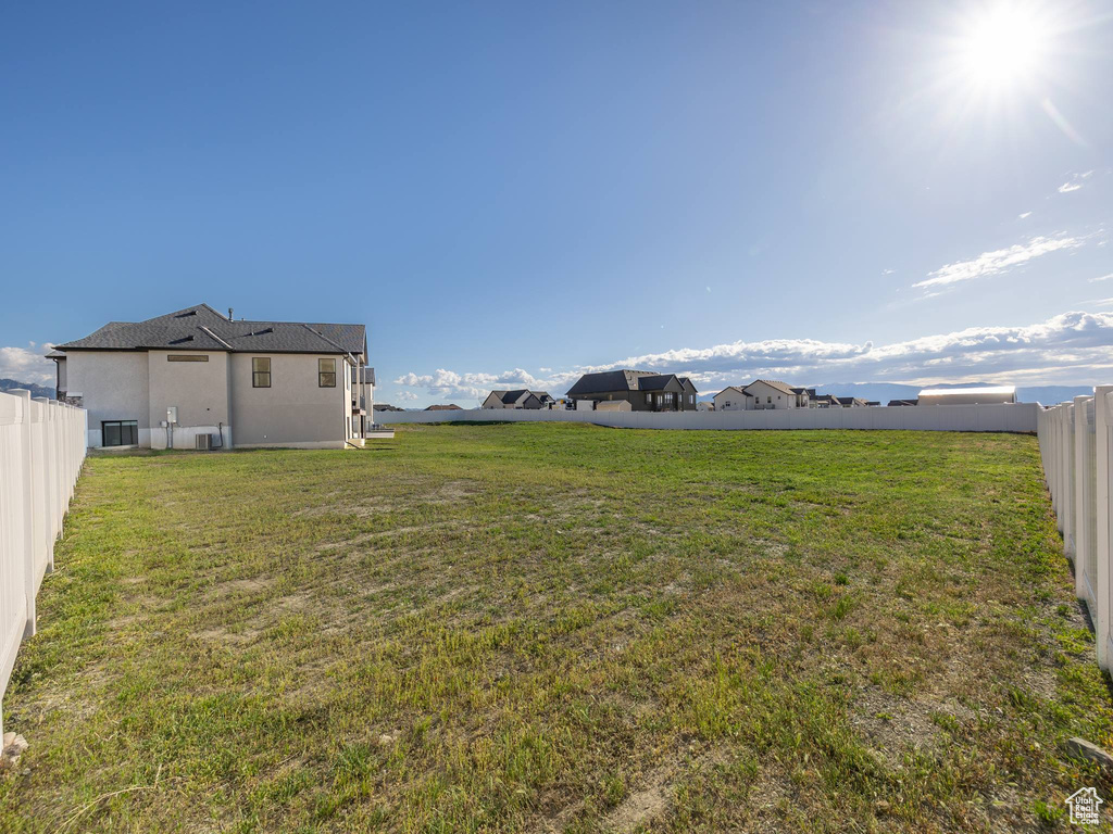 View of yard featuring a fenced backyard