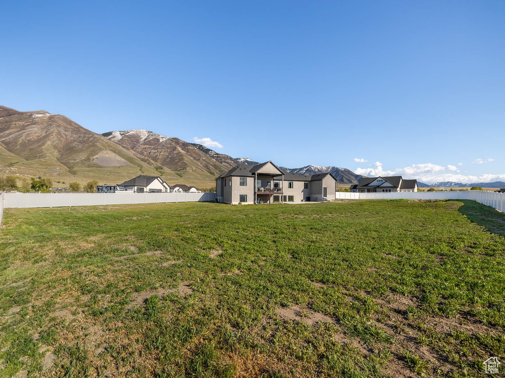 Mountain view featuring a water view