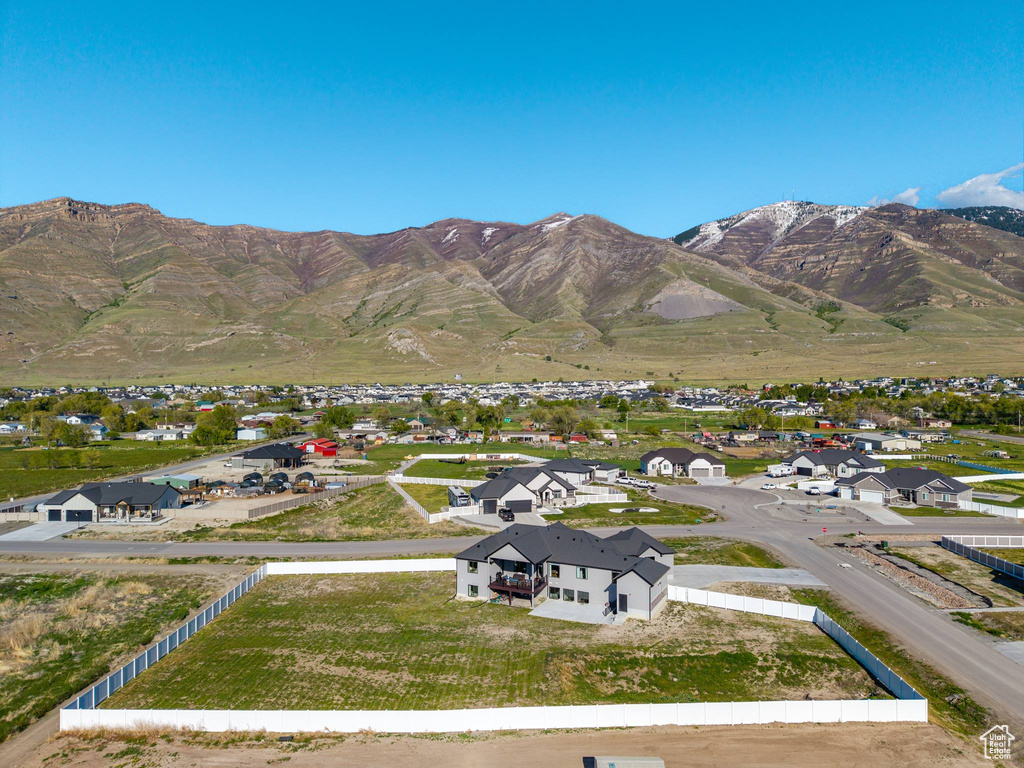 Drone / aerial view featuring a mountain view and a residential view