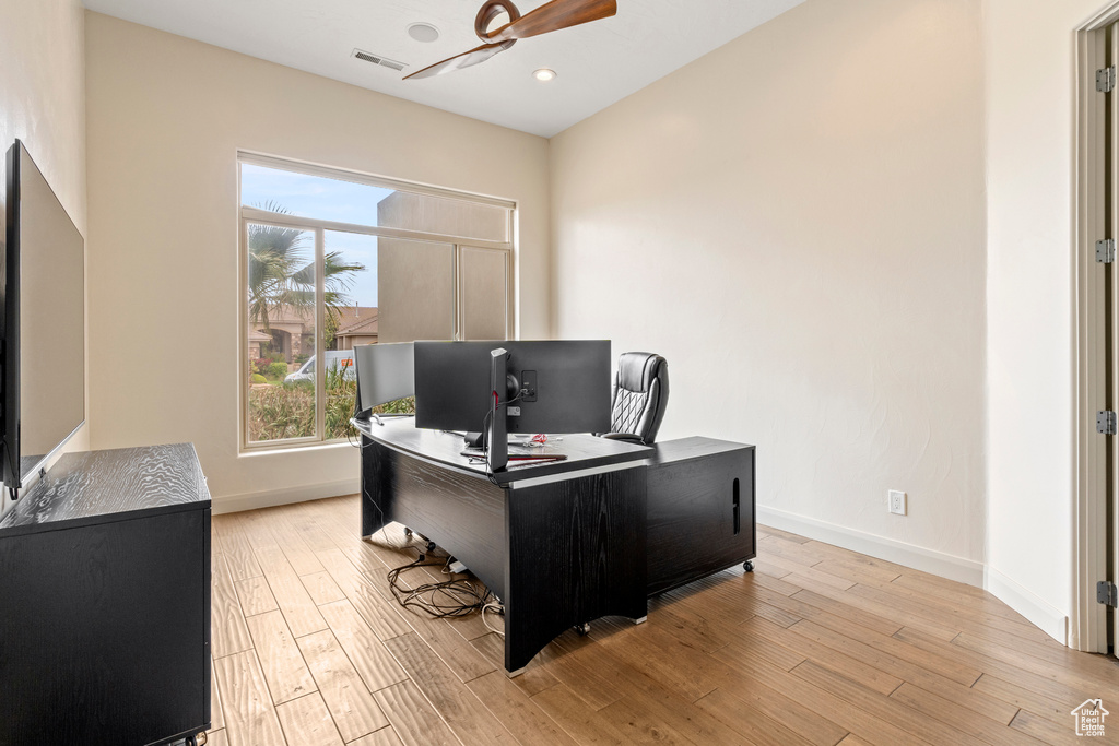 Office area with baseboards, light wood-style flooring, ceiling fan, and recessed lighting