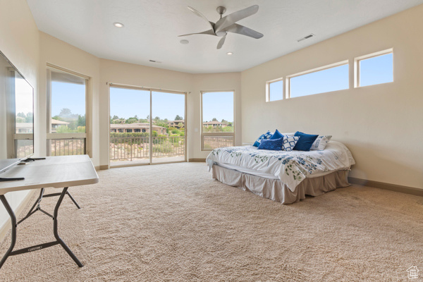 Carpeted bedroom featuring access to exterior, recessed lighting, baseboards, and ceiling fan