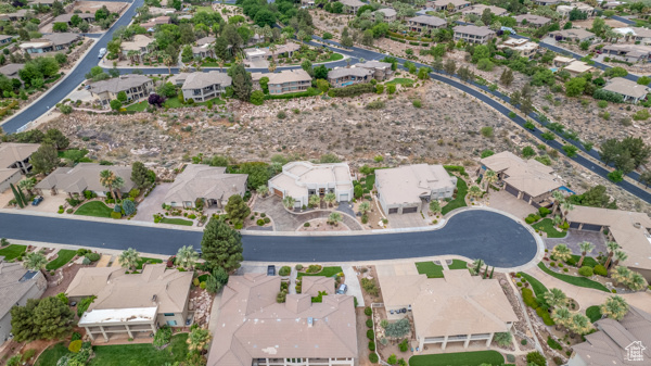 Aerial overview of property's location featuring nearby suburban area