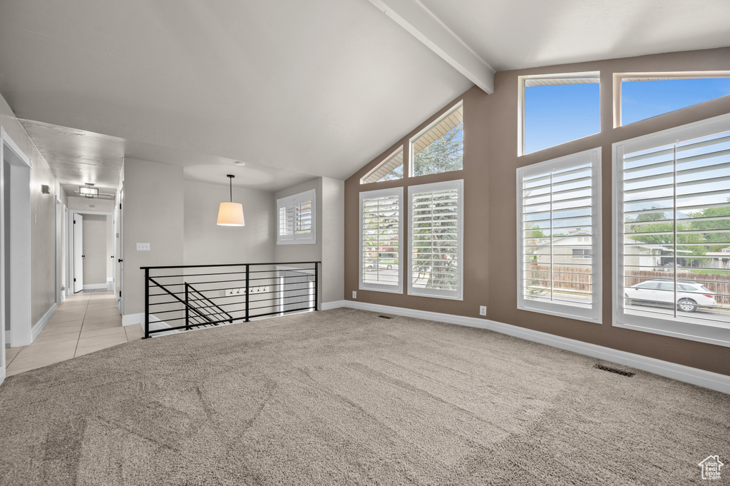 Unfurnished room with baseboards and carpet floors