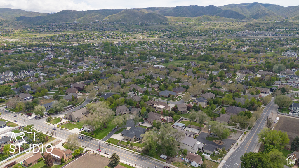 Aerial overview of property's location with mountains