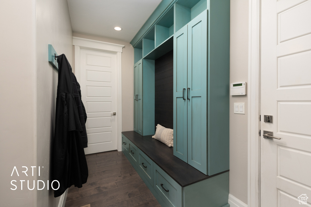 Mudroom featuring dark wood finished floors and recessed lighting