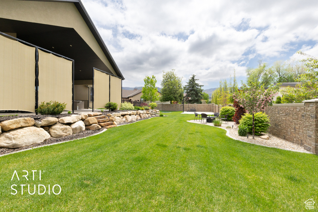 View of yard featuring a patio
