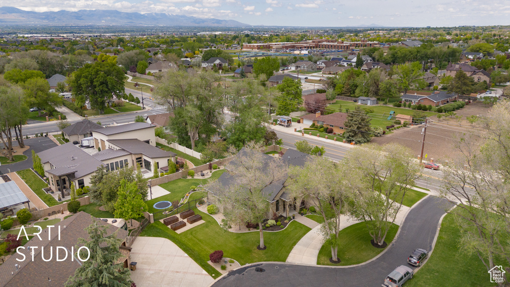 View of property location with a mountain backdrop and nearby suburban area