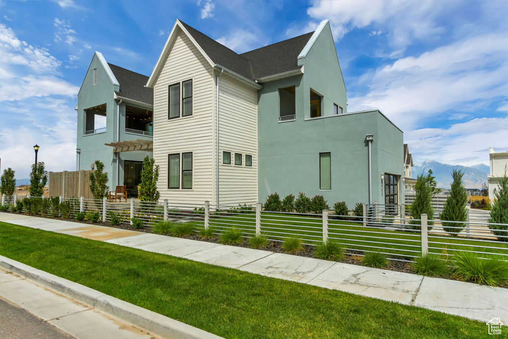 View of front of property with stucco siding