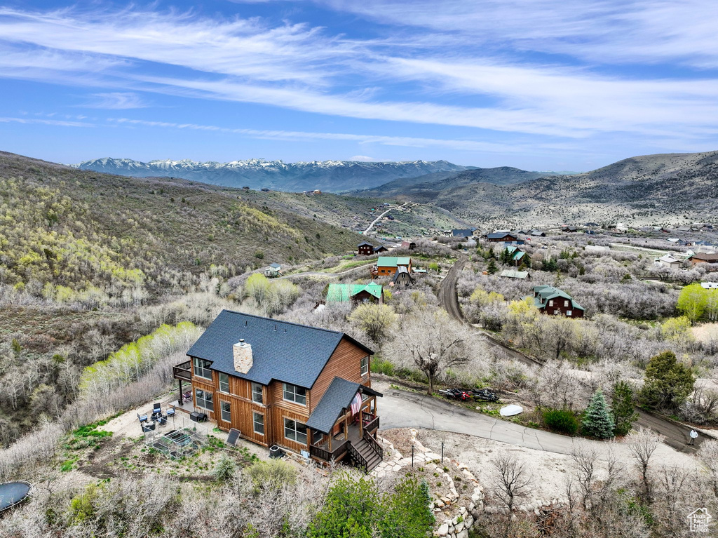 View from above of property featuring a mountain backdrop