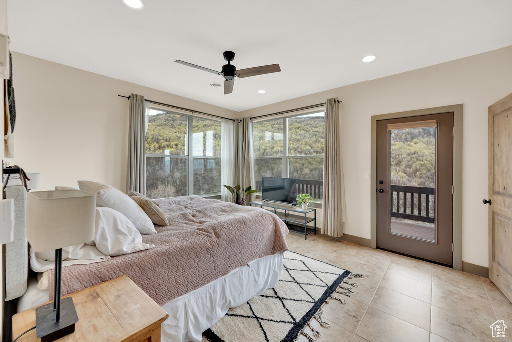 Bedroom featuring access to outside, baseboards, recessed lighting, a ceiling fan, and light tile patterned floors