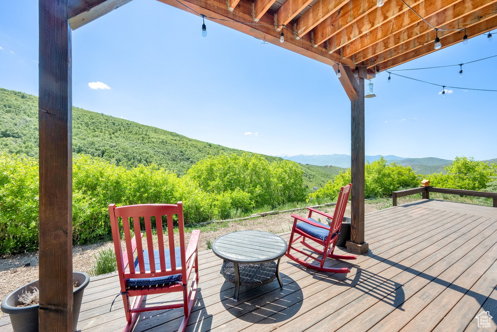 Wooden deck with a mountain view