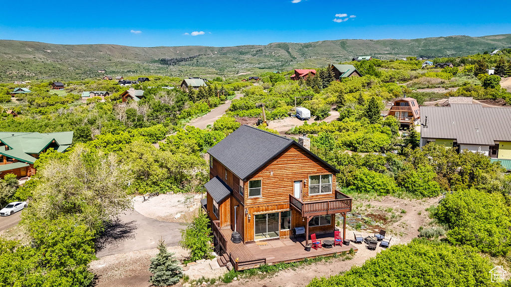 View from above of property featuring a mountain backdrop
