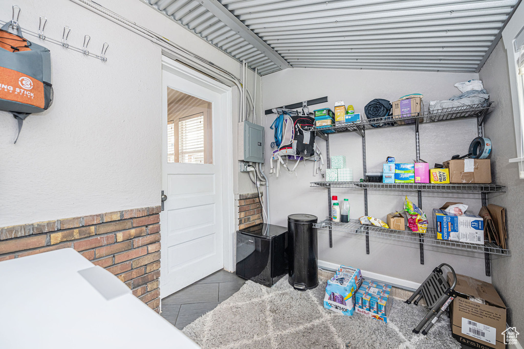 Storage area featuring electric panel