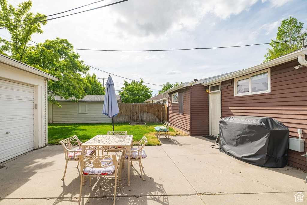 View of patio / terrace with outdoor dining area and a grill